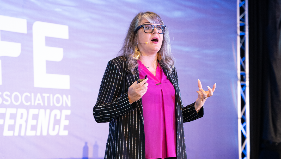 Molly Mahoney presenting at a professional speaking event